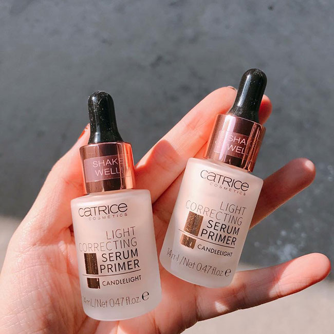 Kem lót Catrice Light Correcting Serum Primer 14ml mỏng nhẹ trên da giúp da tươi sáng, đều màu hơn